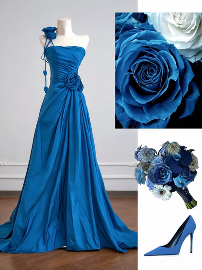 Robe de bal longue bleu roi à une épaule, coupe trapèze simple, ornée de fleurs. Idéale pour un 18e anniversaire. Robe de soirée N342