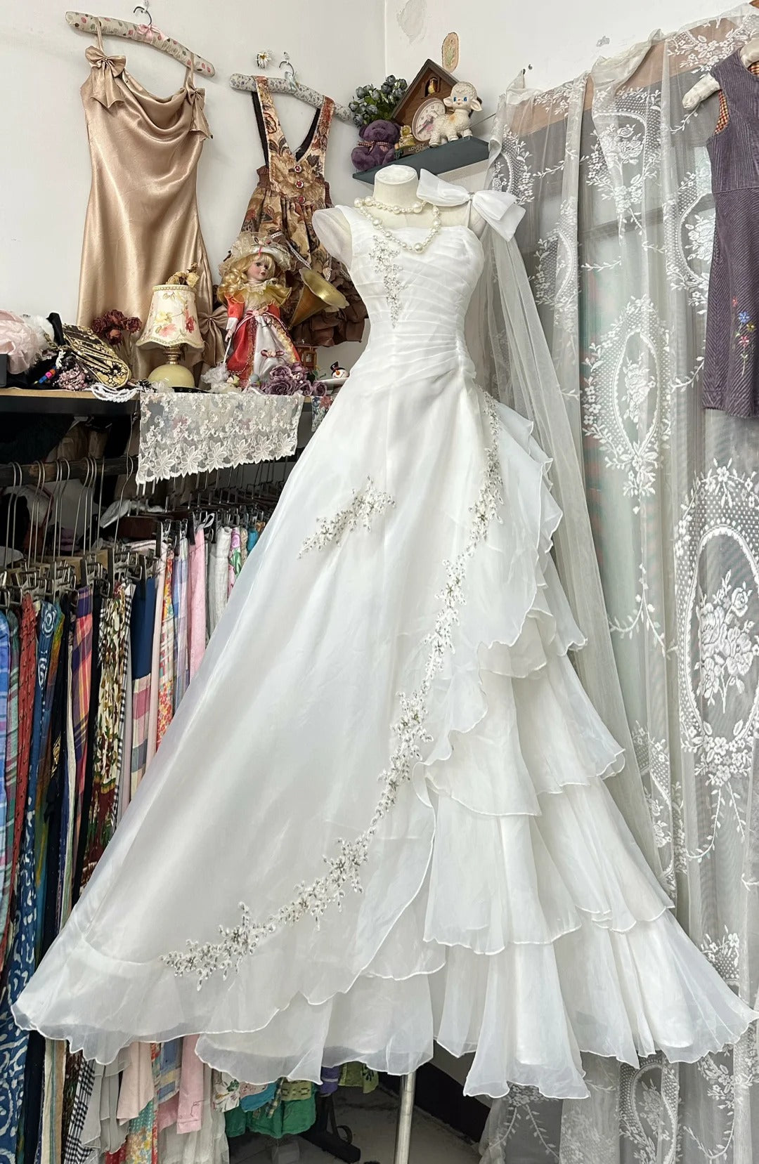 Robes de bal élégantes Robe de soirée blanche à plusieurs niveaux sans manches pour occasions formelles N3772