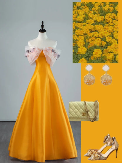 Robe de bal longue en satin orange, coupe trapèze, épaules dénudées, ornée de dentelle appliquée, référence N682