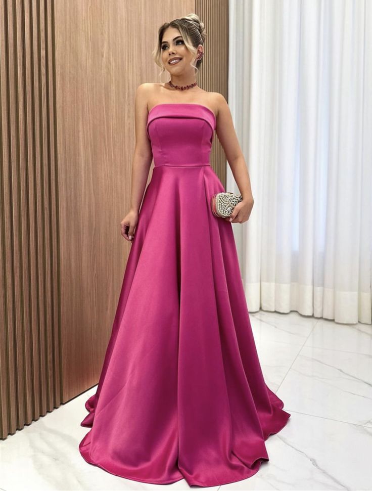Robe de bal longue rose, bustier sans bretelles, coupe trapèze, ornée de perles, idéale pour les mariages et les soirées (N219)
