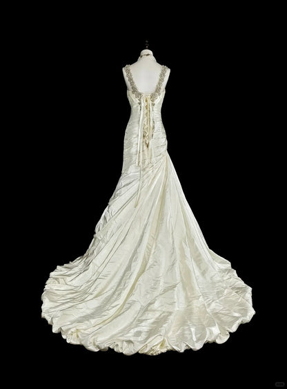 Robe de mariée sirène vintage années 80, décolleté cœur, couleur ivoire, longue et cintrée, référence N1609