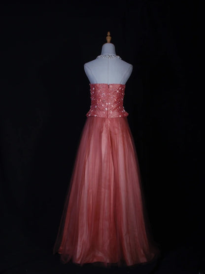 Robe de bal longue vintage en tulle rose, bustier sans bretelles, ornée de perles, coupe trapèze. Idéale pour un 20e anniversaire. Robe de soirée AS284