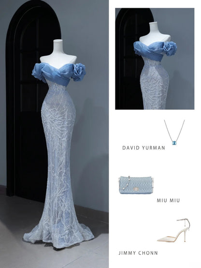 Elegantes, schlichtes Ballkleid im Meerjungfrauenstil mit schulterfreiem Ausschnitt und blauen Pailletten – Inspiration für einen stilvollen Auftritt. Beeindruckendes langes Abendkleid mit Puffärmeln (Modell AS380).