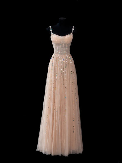 Robe de soirée élégante en tulle champagne, coupe trapèze, bretelles spaghetti, longue et sophistiquée. Tenue de dîner chic. AS609