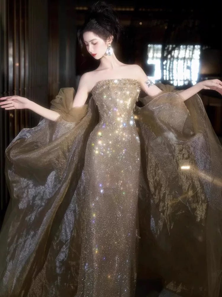 Elegantes Meerjungfrauen-Trägerlos-Champagner-Pailletten-Ballkleid mit Cape für Partys N2031