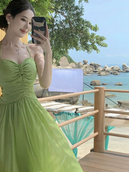 Modeste robe longue trapèze vert émeraude en mousseline avec licou pour femmes, idéale pour les anniversaires, les vacances à la plage, les tenues d'été N3147