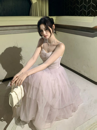 Robe de bal rose en tulle à fines bretelles et coupe trapèze, idéale pour un mariage ou une fête d'anniversaire (16 ans) - AB2427