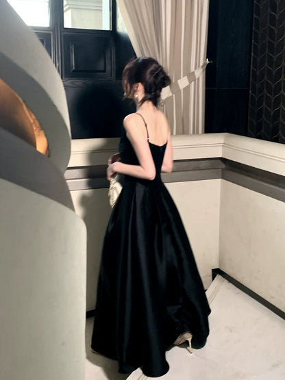 Robe de bal noire en satin, coupe trapèze, bretelles spaghetti, style modeste, idéale pour un mariage ou une fête d'anniversaire (16 ans) AB2428
