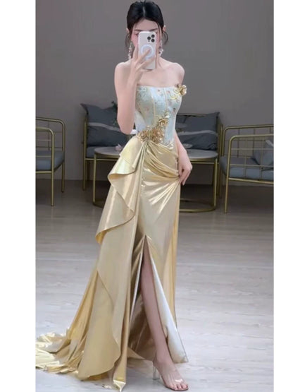 Robe de bal longue sirène dorée sans bretelles et fendue, style modeste, élégante et tendance, idéale pour les soirées et les fêtes de fin d'année (AB2235)