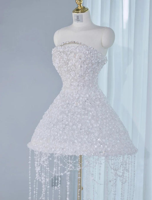 Wunderschönes weißes trägerloses A-Linien-Tüll-Ballkleid mit Perlenbesatz für die Heimkehr RF0748