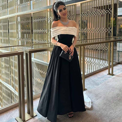 Robe de cocktail en satin pour femme, coupe trapèze, style célébrité, noire, épaules dénudées, disponible en ligne AB1866