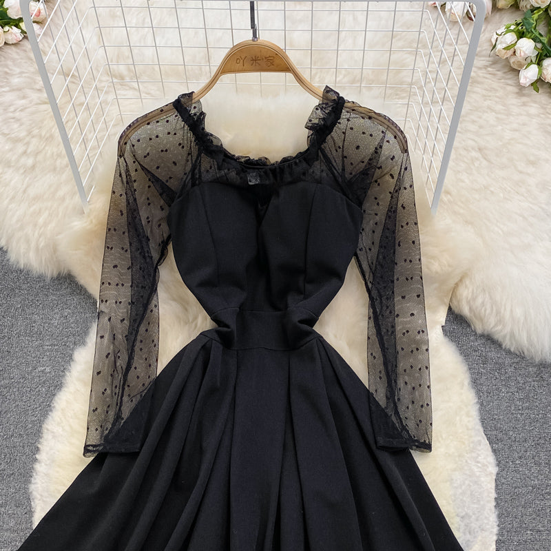 Robe courte noire à manches longues et coupe trapèze, RF0230